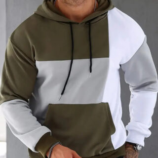 Pull vert et blanc porté par un homme.