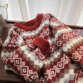 Pull en jaquard avec des motifs marron et blanc